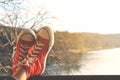 Feet red sneaker a girl in nature and relax time Royalty Free Stock Photo