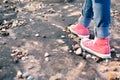 Feet red sneaker a girl in nature and relax time Royalty Free Stock Photo