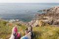 Feet Resting after a Hike, Rocky Coast, Mallin Head, Ireland