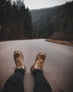 Feet on the road in forest Royalty Free Stock Photo