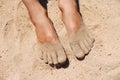 Feet in sand Royalty Free Stock Photo