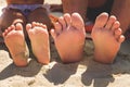 Feet in the sand heel beach Royalty Free Stock Photo