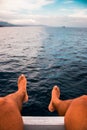 Feet with the sea in the background. Royalty Free Stock Photo