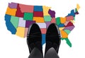 Feet with shiny shoes above america-