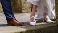 Feet with shoes of bride and groom - wedding shoes Royalty Free Stock Photo