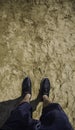 Feet with slippers on the beach Royalty Free Stock Photo