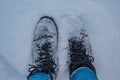 Feet on snow, walk on snowy ground