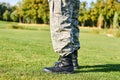 Feet of soldier in military boots. Royalty Free Stock Photo