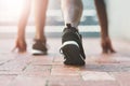 Feet, sport and runner start on pavement with person and athlete for running and jog. Shoes, wellness, fitness with Royalty Free Stock Photo