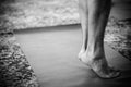 Feet standing on yoga mat Royalty Free Stock Photo