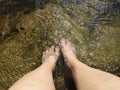 Feet in a stream