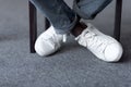 Feet in stylish white shoes Royalty Free Stock Photo