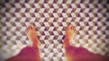 Feet on tile floor