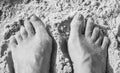 Feet and Toes in the Sand on a Beach Royalty Free Stock Photo