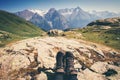 Feet trekking boots hiker with mountains landscape outdoor