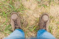 Feet trekking boots hiking Traveler alone outdoor wild nature Li Royalty Free Stock Photo