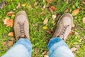 Feet trekking boots hiking Traveler alone outdoor wild nature Lifestyle Travel extreme survival concept summer adventure vacations Royalty Free Stock Photo