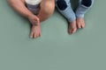 Feet of twins newborns, brother and sister, multiple pregnancy. Royalty Free Stock Photo