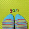 Feet wearing socks and number 2017, as the new year