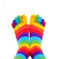 Feet wearing winter colorful striped socks