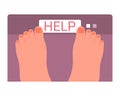 Feet on weight scale with help instruction Royalty Free Stock Photo