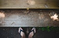 Feet with Welcome All sign