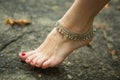 Feet of women in ethnic ornaments