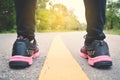 Feet women running on the road for health