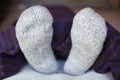 Feet in woolen socks Royalty Free Stock Photo