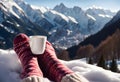 Feet in woollen socks by the Alps mountains view