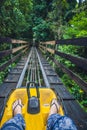 Feet of a young woman on Alpine Coaster Royalty Free Stock Photo