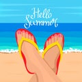 Feet of a young woman on the background of the ocean with hand-written Hello Summer