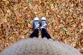 Feets on yellow leaves Royalty Free Stock Photo