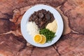 Feijoada. Traditional Brazilian Food Dish. Wood background. Top view. Copy space