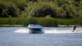Water skiing at Wiremill Lake near Felbridge Surrey on August 2, 2020. Two unidentifed people