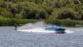Water skiing at Wiremill Lake near Felbridge Surrey on August 2, 2020. Two unidentifed people