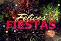 Felices Fiestas. Festive greeting card with happy holiday`s wishes in Spanish on bright background Royalty Free Stock Photo
