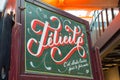 Felicita, Paris, France. Close up of the entrance food market sign