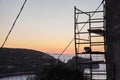 Feline colony during sunup on calamosca beach from capo sant`Elia lighthouse