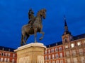 Felipe III Statue in plaza mayor in Madrid at dawn or twilight perspective view Royalty Free Stock Photo