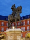Felipe III Statue in plaza mayor in Madrid at dawn or twilight perspective view Royalty Free Stock Photo