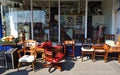 Antique Shop with furniture on pavement outside.