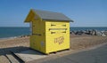 Yellow Beach Hut housing beach side foof outlet \