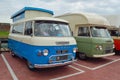 Classic Commer Camper Vans parked together.