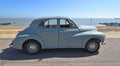 Classic Grey Morris Oxford Motor Car Parked on Seafront Promenade.