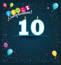 Feliz Cumpleanos 10 - Happy Birthday 10 in Spanish language - Greeting card with white candles Royalty Free Stock Photo