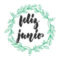 Feliz junio - Happy june in spanish, hand drawn latin summer month lettering quote with seasonal wreath isolated