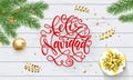 Feliz Navidad Spanish Merry Christmas holiday golden decoration and calligraphy font for greeting card white wooden background. Ve Royalty Free Stock Photo