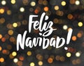 Feliz Navidad - spanish Merry Christmas text. Holiday greetings quote. Glowing golden lights on dark background, bokeh