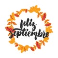 Feliz septiembre - happy september in spanish, hand drawn latin autumn month lettering quote with seasonal wreath Royalty Free Stock Photo